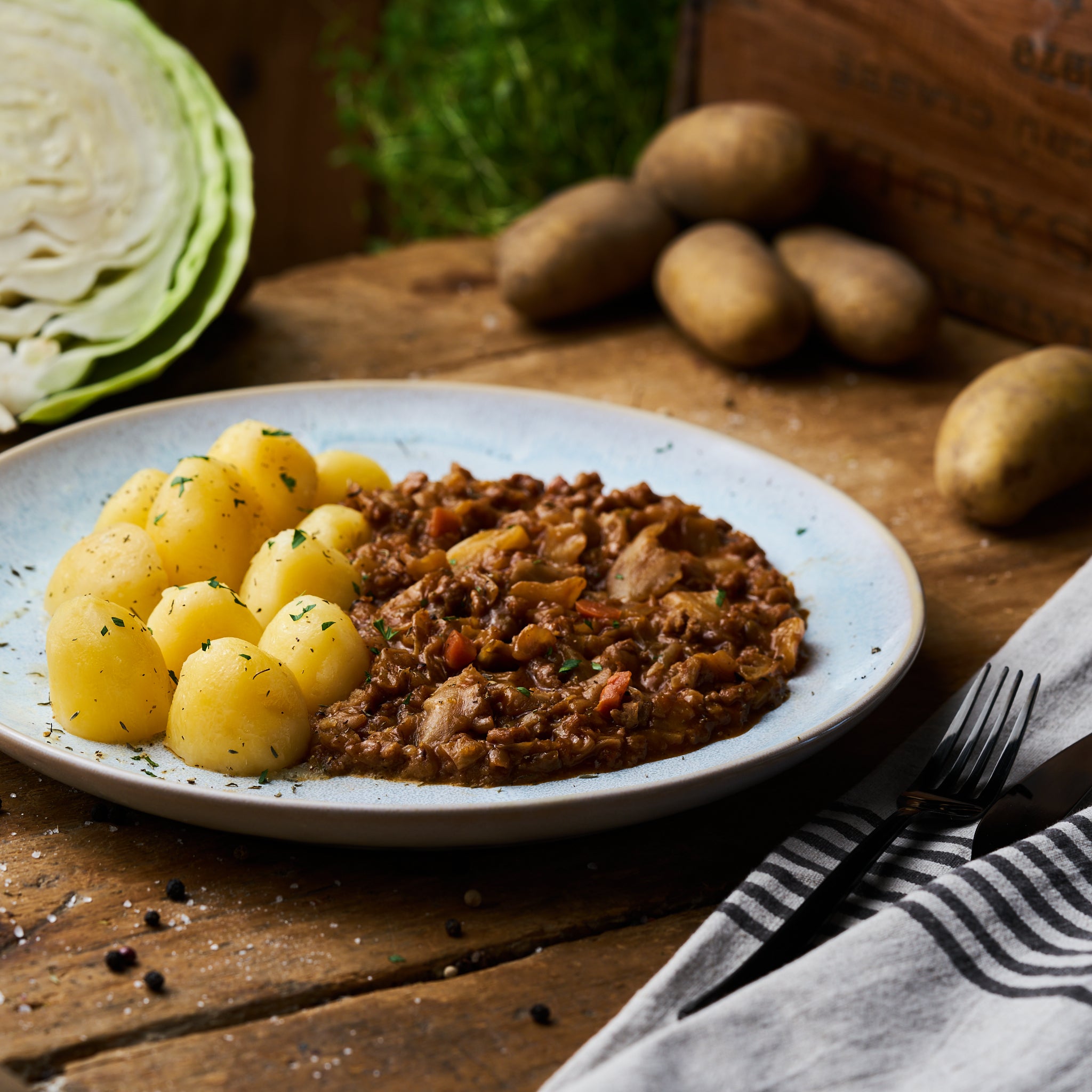 Schmorkohltopf mit Butterkartoffeln